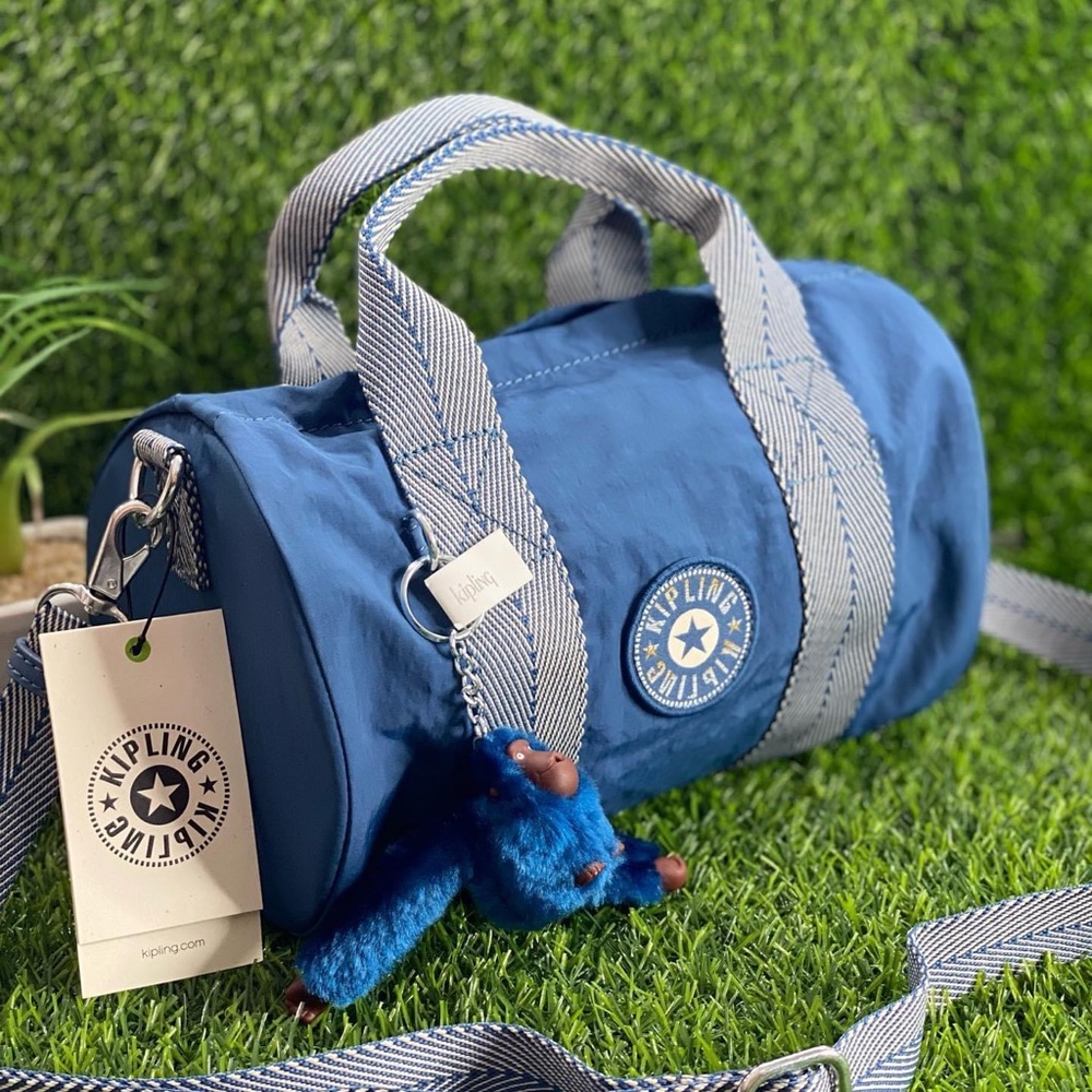 NWOT Kipling crossbody bag. Denim blue.